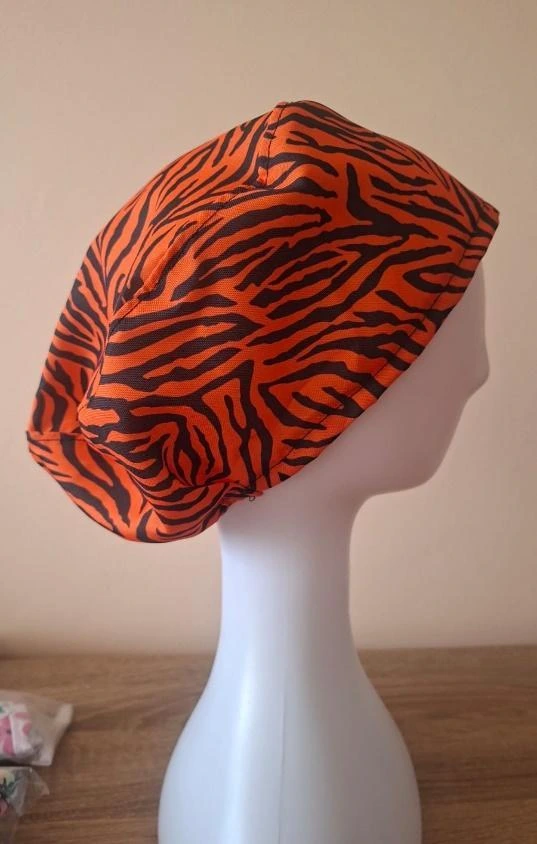 Cofia animal print naranjo